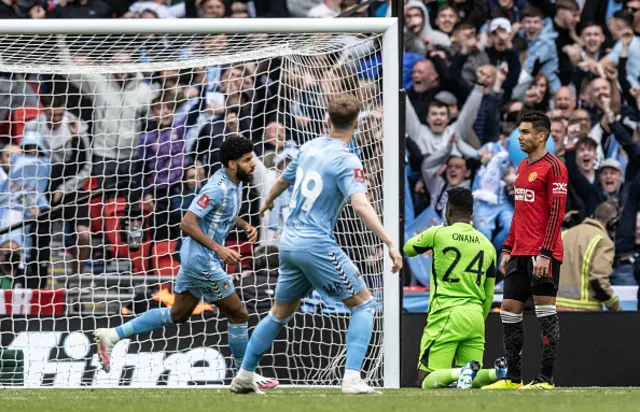 Coventry City's Ellis Simms (left) celebrates scoring his side's first goal