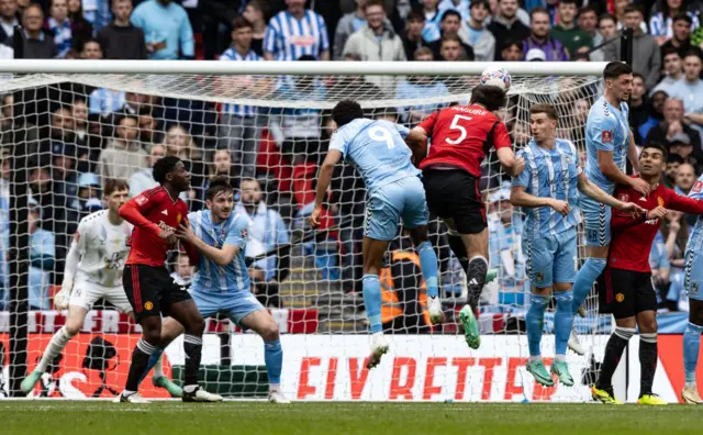 Harry Maguire heads in