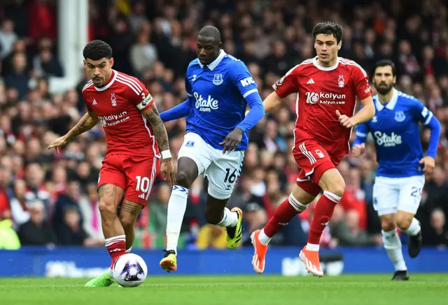 Morgan Gibbs-White in action with Everton's Abdoulaye Doucoure