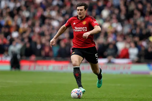 Harry Maguire runs with the ball