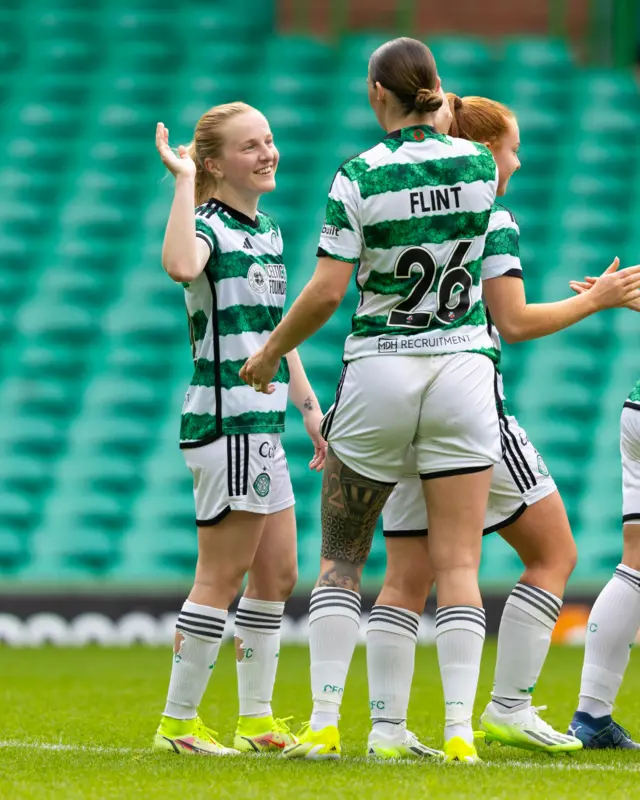 Celtic's Murphy Agnew and Natasha Flint high five