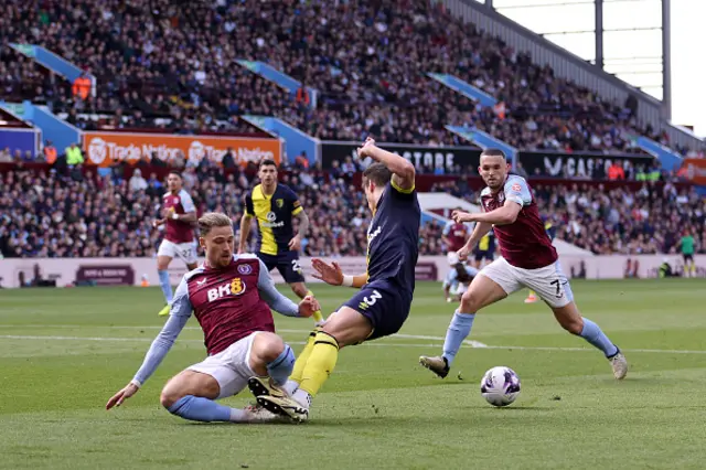 Milos Kerkez of AFC Bournemouth is fouled by Matty Cash of Aston Villa which leads to a penalty