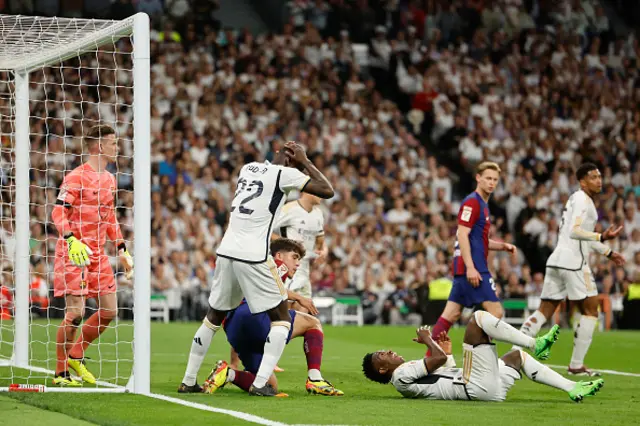 Real Madrid's German defender Antonio Rudiger reacts as Real Madrid's Brazilian forward Vinicius Junior