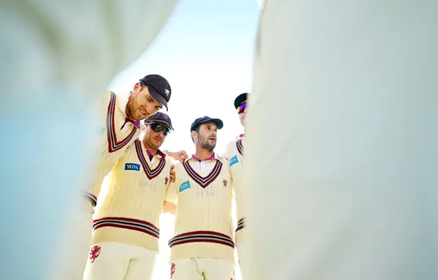 Somerset cricket team in a huddle