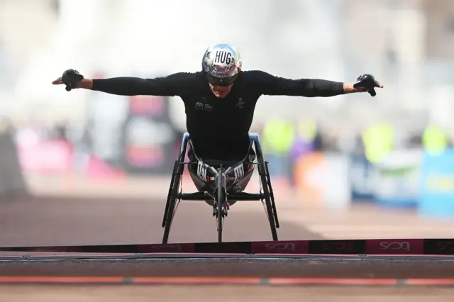 Switzerland's Marcel Hug wins men's wheelchair race at the London Marathon