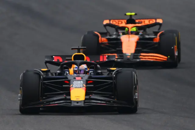 Max Verstappen leads Lando Norris