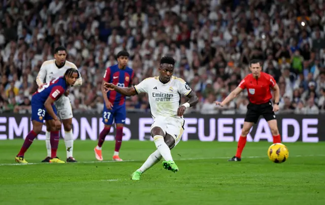 Vinicius Junior of Real Madrid scores his team's first goal