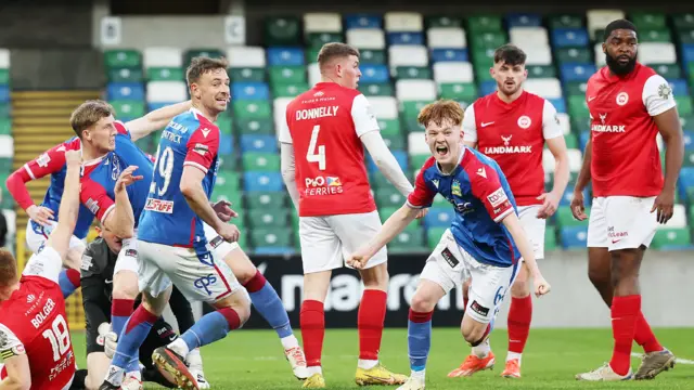 Linfield celebrate scoring the opening goal