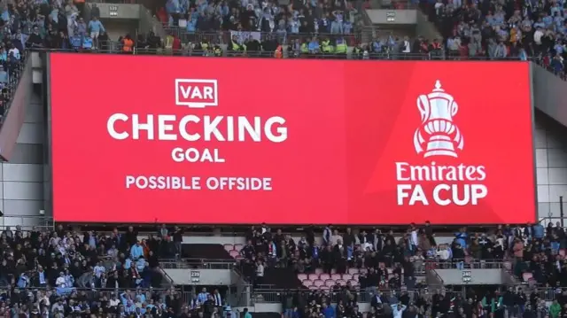 "Checking offside" graphic in Wembley