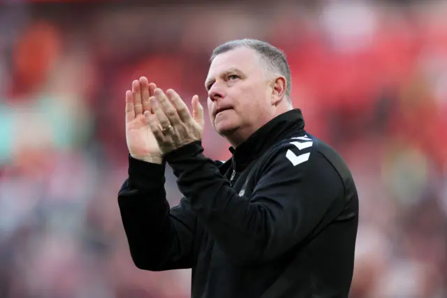 Mark Robins applauds Coventry fans at Wembley