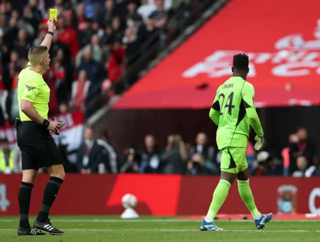 Andre Onana booked during FA Cup semi-final penalty shootout