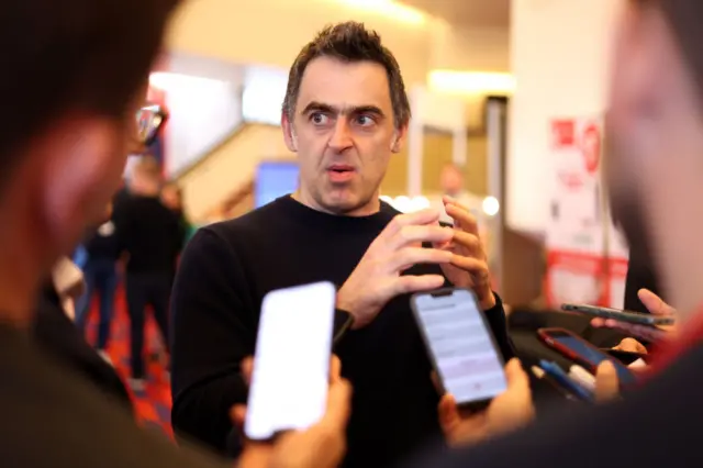 Ronnie O'Sullivan talks to reporters