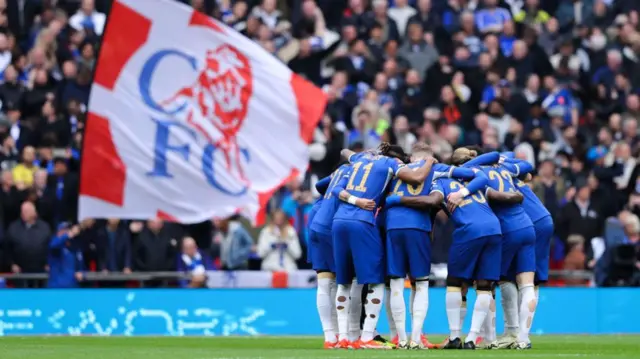 Chelsea players in a huddle