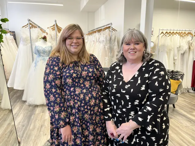 Two women in a bridal shop