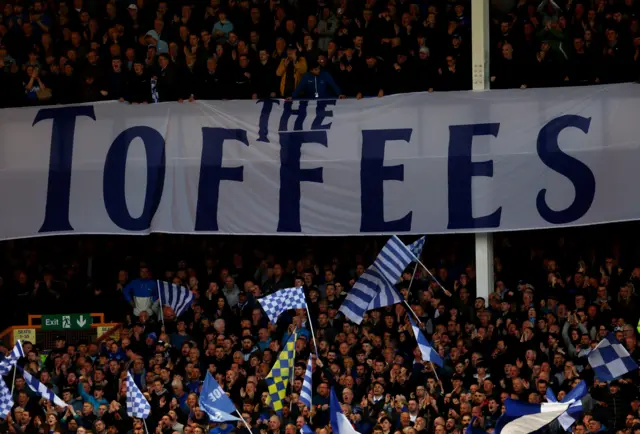 Fans unvail a 'The Toffees' banner in the Gwlady street end