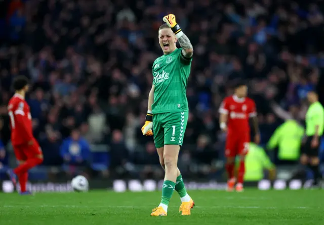 Pickford celebrates Everton's goal as Liverpool stand stunned