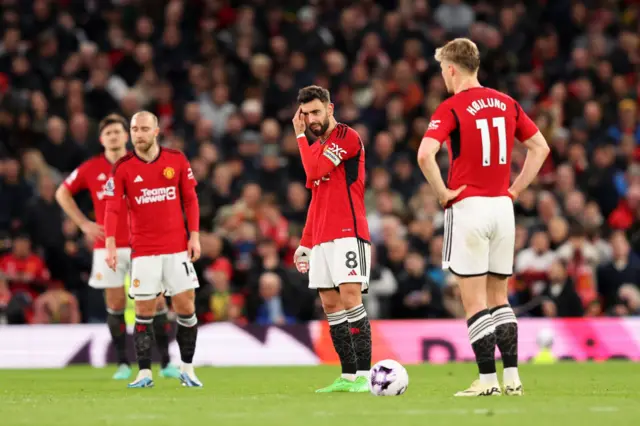 United players stabd stunned after conceding the opener