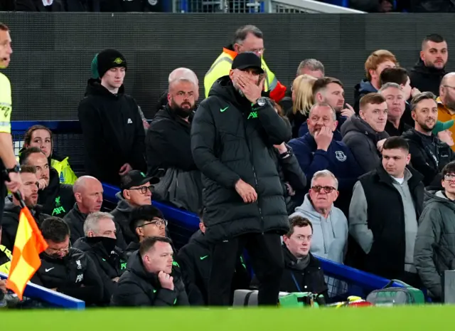 Klopp puts his hand over his mouth in disbelief