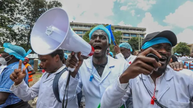 Intern doctors and medical practitioners rally during a protest against the government's failure to hire intern doctors and demanding better working conditions including permanent employment, in Nairobi, Kenya, 16 April 2024