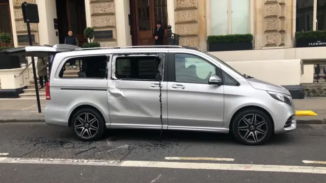 A badly damaged vehicle outside the Clermont hotel