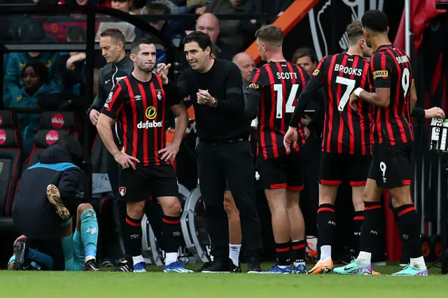 Andoni Iraola, Manager of AFC Bournemouth, speaks to players on the touchline