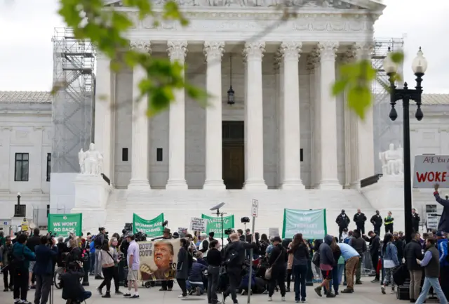 Protestors assemble outside the Supreme Court in Washington DC