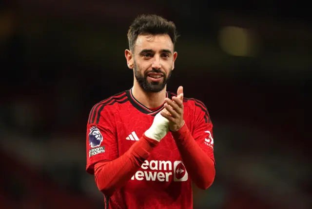 Bruno Fernandes applauds the Manchester United fans