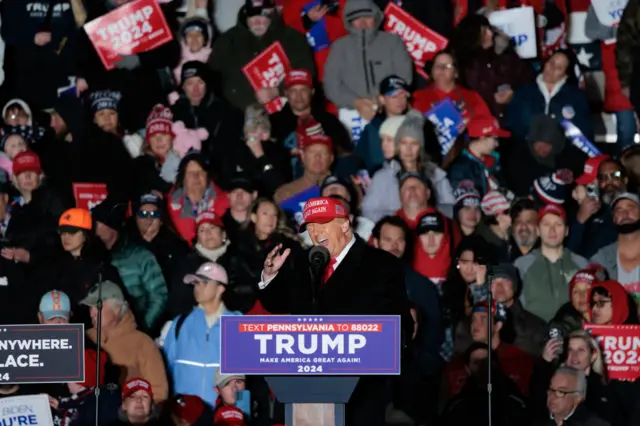 Former US President Donald Trump speaks onstage during a campaign rally at the Schnecksville Fire Hall in Schnecksville, Pennsylvania, US, on Saturday, April 13, 2024