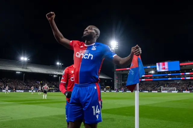 Jean-Philippe Mateta celebrates at the corner flag