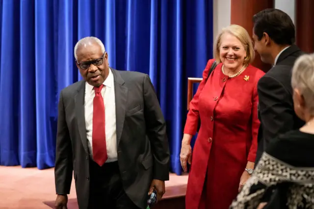 Justice Clarence Thomas and his wife pictured in 2021