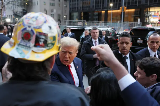 Republican presidential candidate and former U.S. President Donald Trump reacts as he meets with Union workers in New York City,