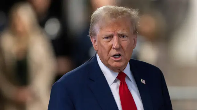 Former U.S. President Donald Trump speaks to members of the media at Manhattan Criminal Court in New York, U.S., on Thursday, April 25, 2024.