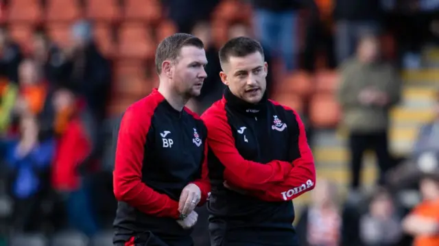 Airdrie Manager Rhys McCabe (R) and Coach Bryan Prunty during a cinch Championship match between Airdrionians and Dundee United at Excelsior Stadium, on April 26, 2024, in Airdrie, Scotland.