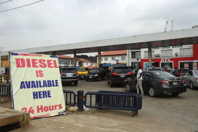 A banner is displayed to advertise diesel available at a filling station in Lagos, Nigeria's commercial capital on March 14, 2022