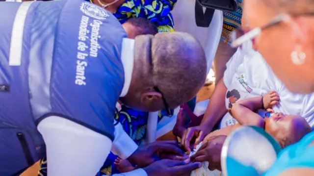 A child immunised with the malaria vaccine in Benin on 25 April 2024