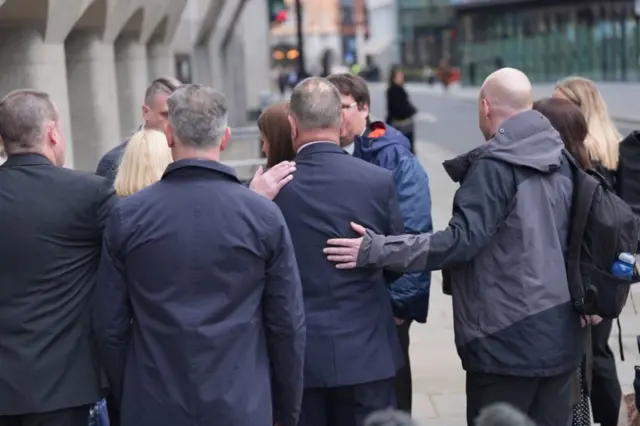 Families of the stabbing victims leaving the Old Bailey press conference