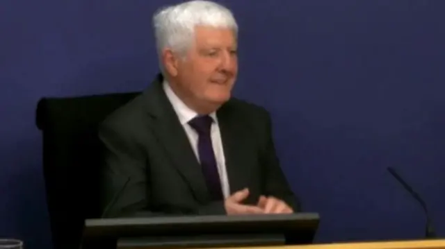 Screengrab of chair Sir Wyn Williams at the inquiry