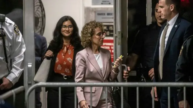 Susan Necheles (centre) walking towards the courtroom on Friday