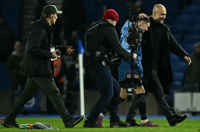 Pep Guardiola congratulates Phil Foden after the England midfielder scored twice in Thursday's 4-0 win at Brighton