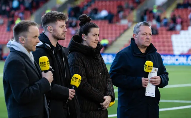 Dundee United's Ross Docherty, Leanne Crichton and Billy Dodds during a cinch Championship match between Airdrionians and Dundee United at Excelsior Stadium, on April 26, 2024, in Airdrie, Scotland.