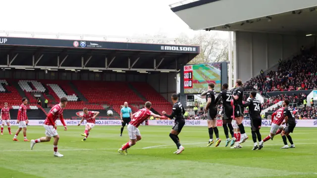 Scott Twine scores a free-kick for Bristol City