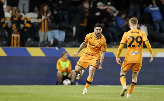 Ozan Tufan celebrates equalising for Hull against Ipswich