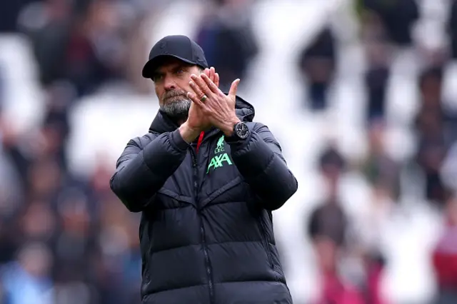 Liverpool Manager Jurgen Klopp applauds the fans