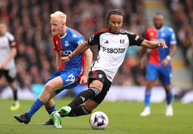 Bobby Reid of Fulham is challenged by Will Hughes