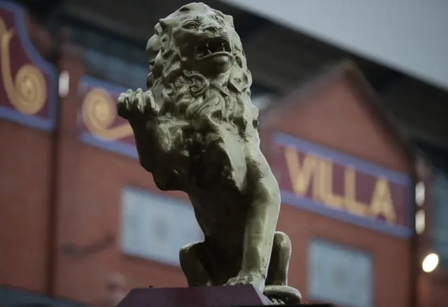 The lion stone work outside the Holte End at Villa Park