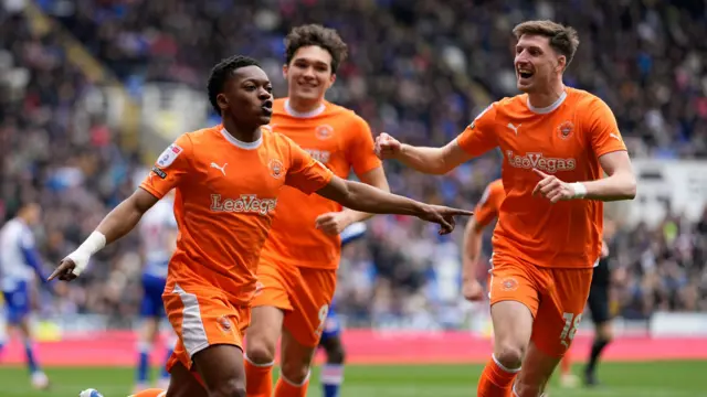 Karamoko Dembélé, of Blackpool, celebrates scoring