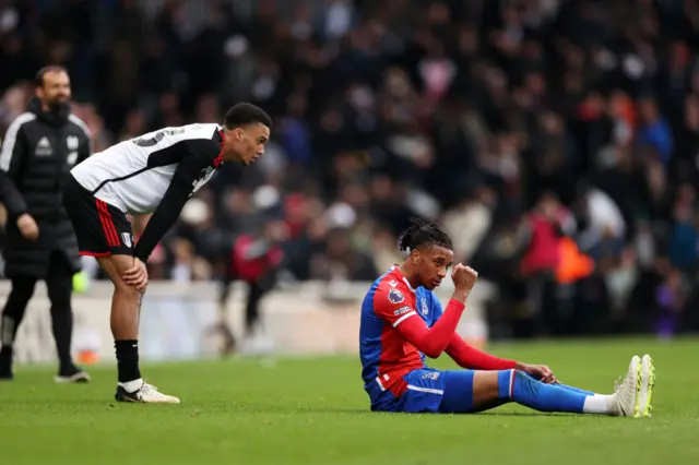 Olise and Robinson react the referee's whistle