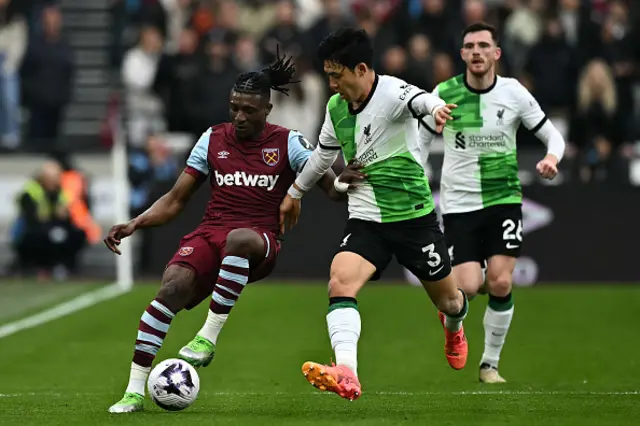 West Ham United's Ghanaian midfielder Mohammed Kudus vies with Liverpool's Japanese midfielder Wataru Endo