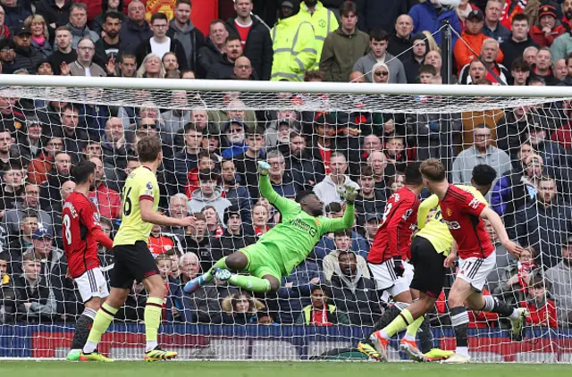 Andre Onana of Manchester United makes a save