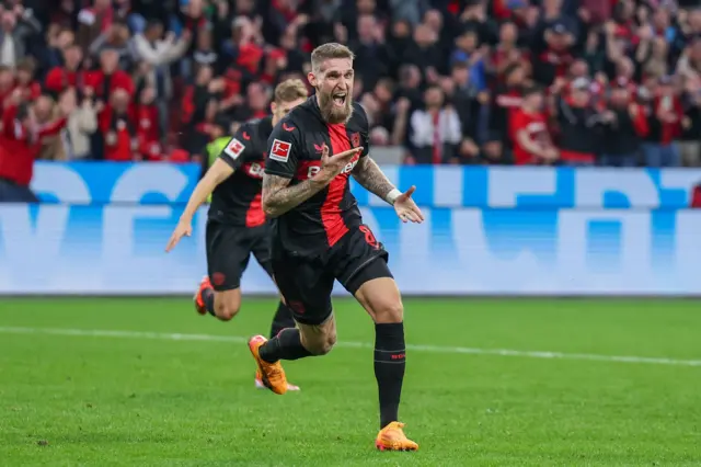 Andrich celebrates scoring a late equaliser for Leverkusen